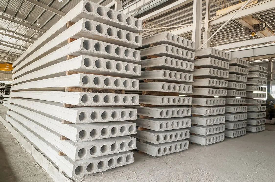 Stacks of precast hollow-core slabs cured and stored in a precast concrete plant
